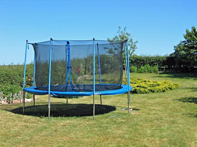 How to Mow Under a Trampoline?